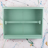 arsenic-glass-cabinet-23