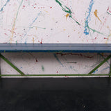 Children's wooden bench with blue top and metal frame
