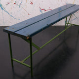 Children's wooden bench with blue top and metal frame