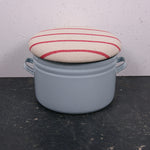 round-light-blue-maggie-with-red-stripe-1
